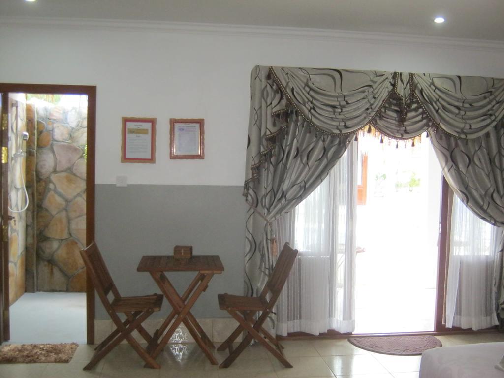 Pat Pat Guesthouse Sihanoukville Værelse billede
